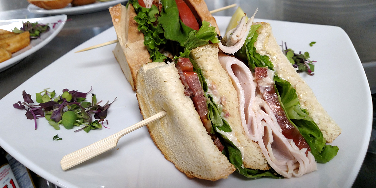Lunch Features - Double-Decker Turkey Club Sandwich - Sauk-Prairie Grill